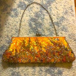 Beaded sequins purse orange.  Silver tone. removable chain to use as clutch